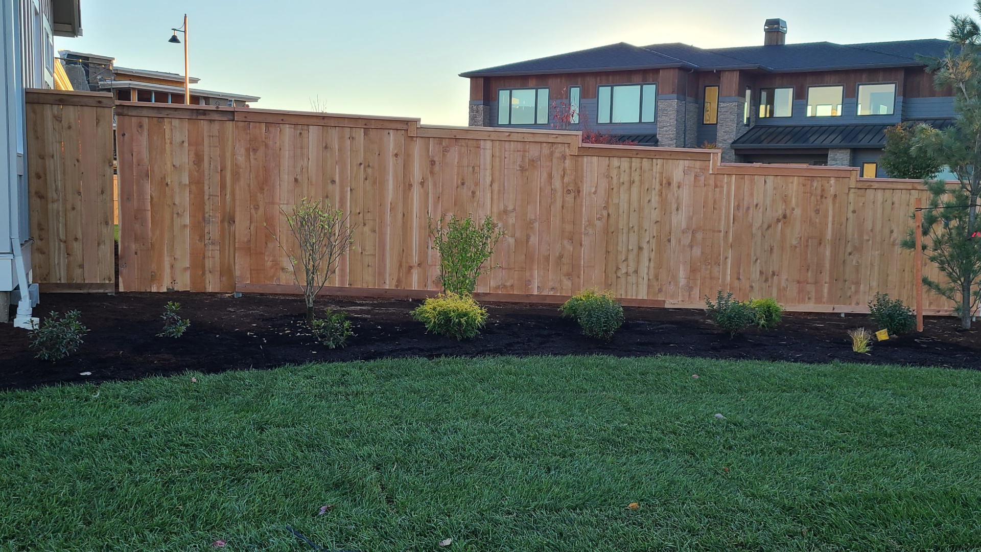 Jones N.W. Fence Co. crew installing a wood fence